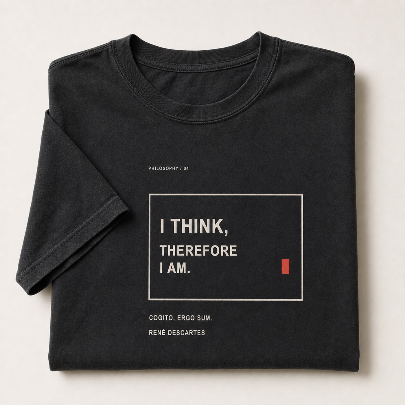 Cogito printed on a folded Pepper heavyweight T-shirt.
