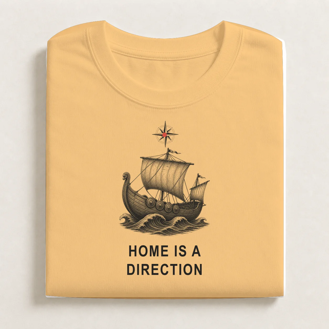 Home printed on a folded Vintage Gold T-shirt.