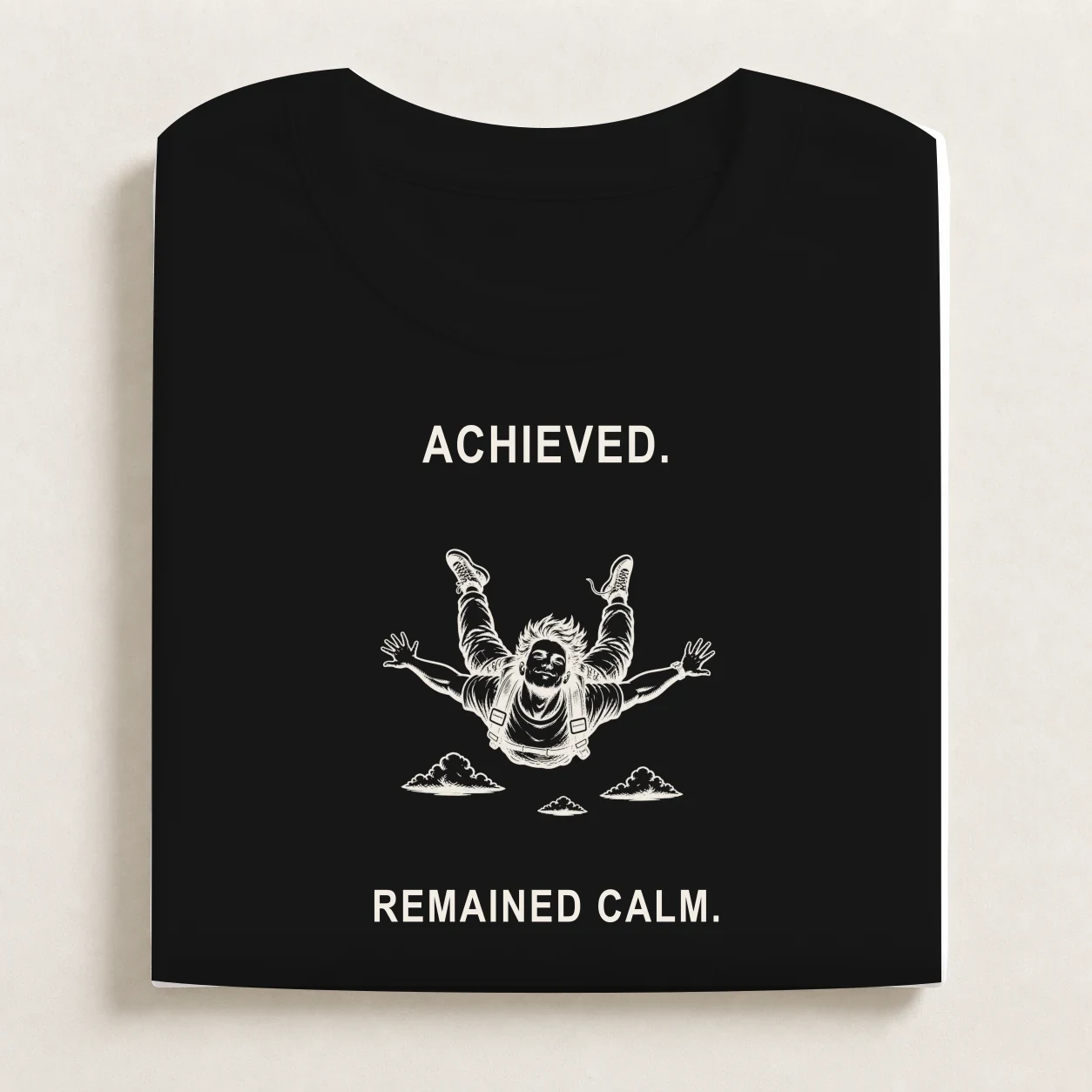 Terminal Velocity printed on a folded Black T-shirt.