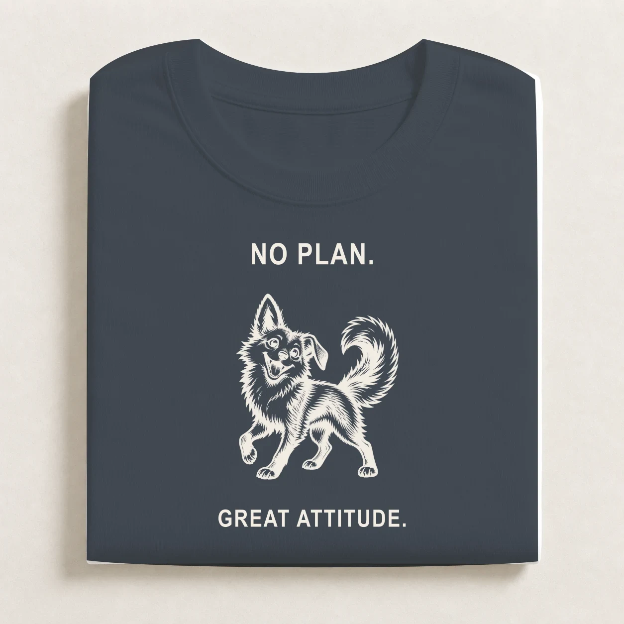 Folded Petrol Blue shirt with the Feral Optimism print.